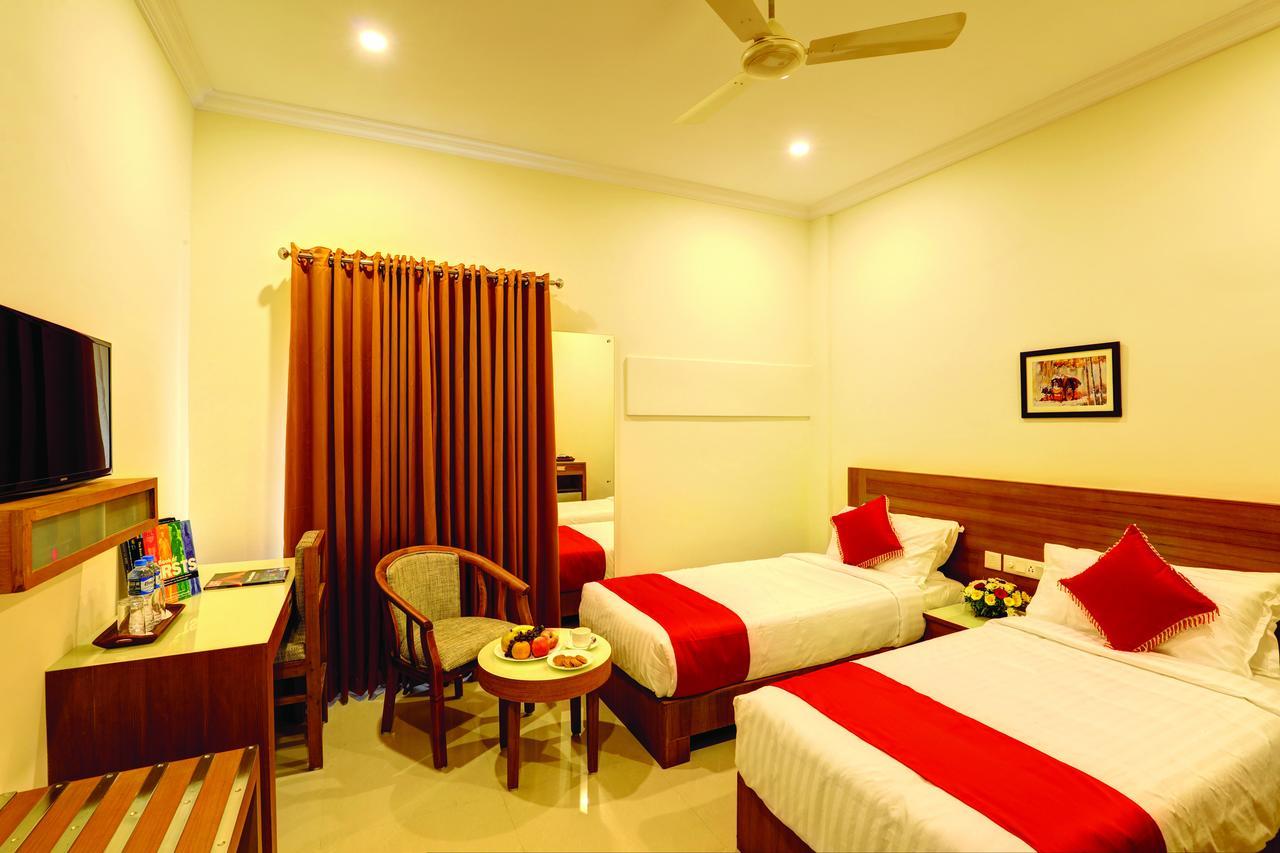 Hotel Floral Park Kottayam Extérieur photo